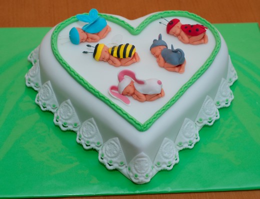 obrázek dortu - dort Miminka Anne Geddes na srdci